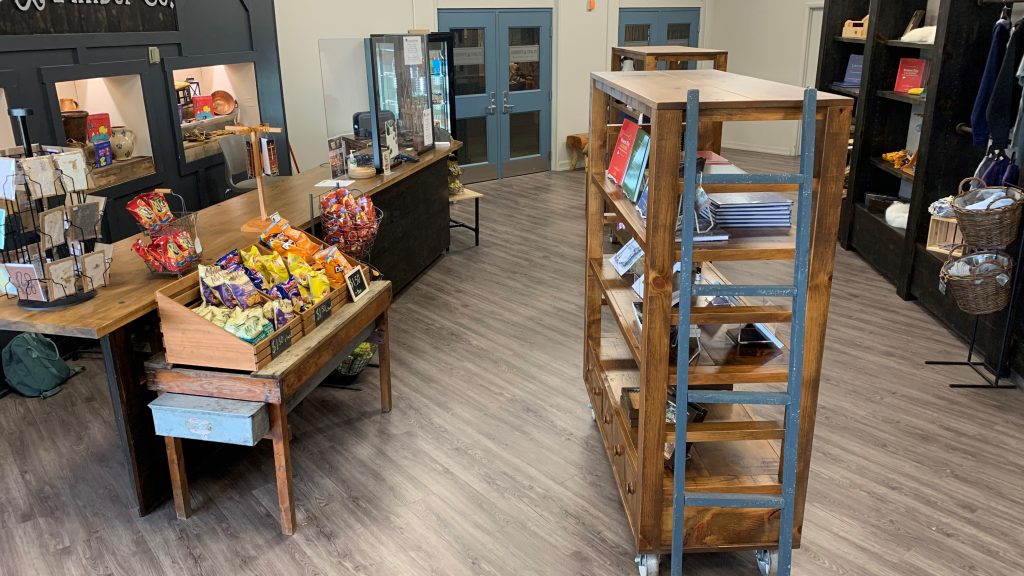 A view of our gift shop from the main entrance. From here visitors get a good view of some of the snacks, cards, books and drinks we have available in the store.