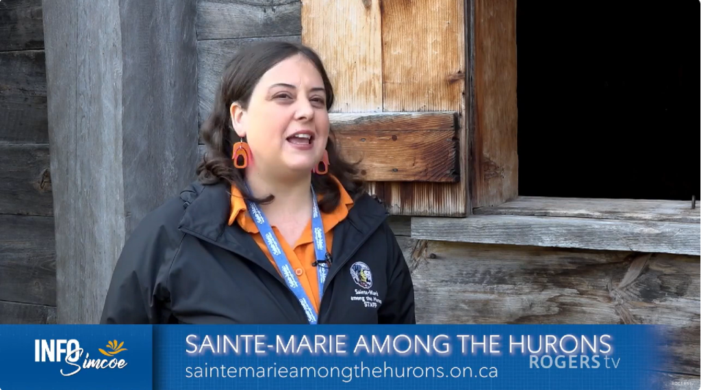 What's happening at Sainte-Marie among the Hurons this fall - screenshot of Mikaela speaking on this topic on Rogers TV