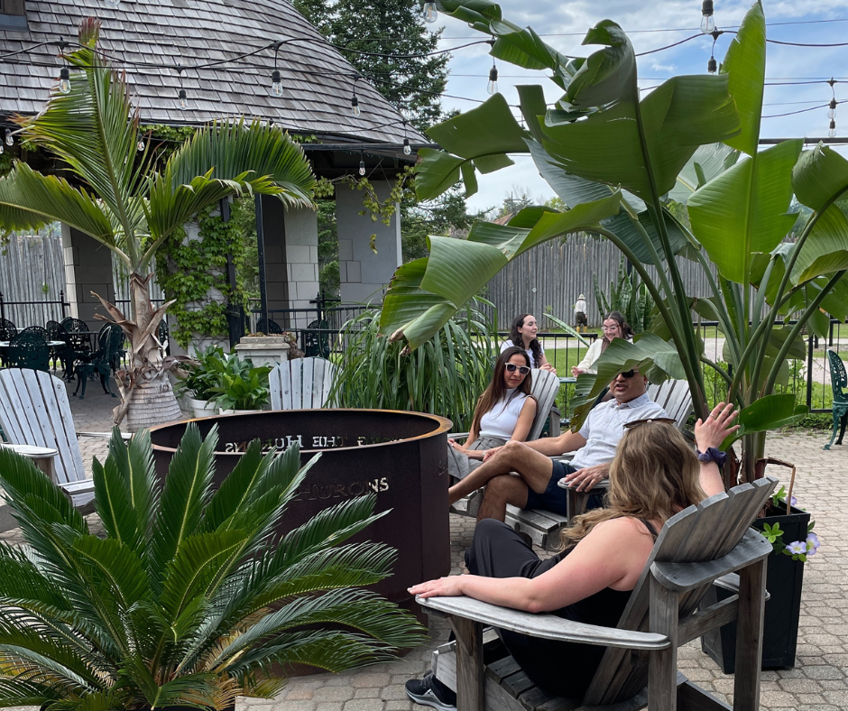 A group enjoying the patio at Sainte-Marie