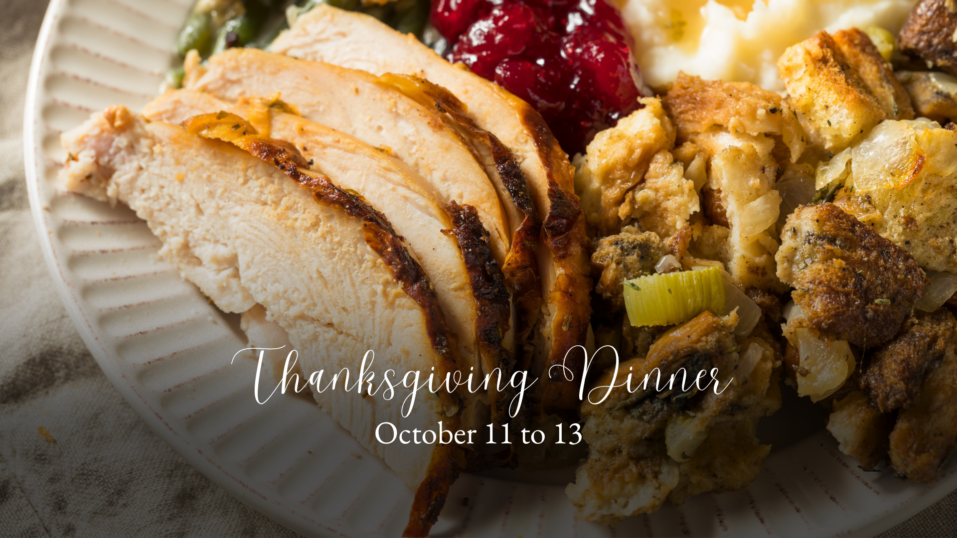 A plated turkey dinner with the text: Thanksgiving Dinner, October 11 to 13