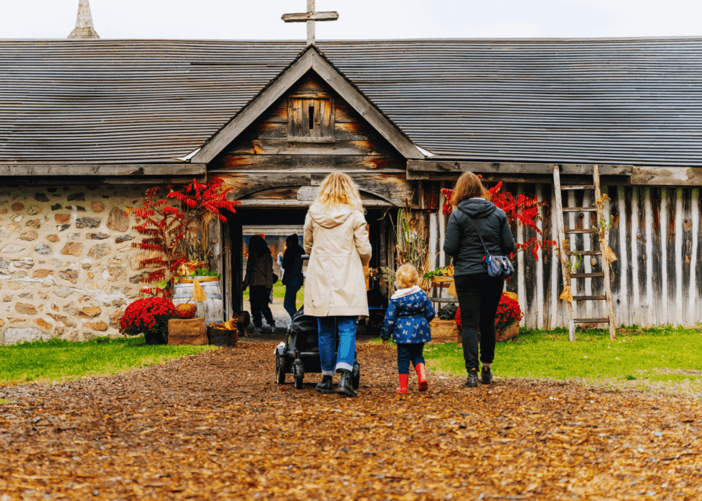 A family walking into the historic site