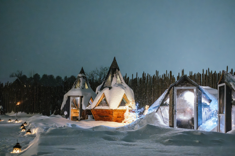 Dining domes in the snow at First Light