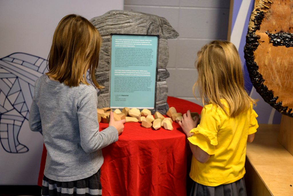 Kids playing with exhibit